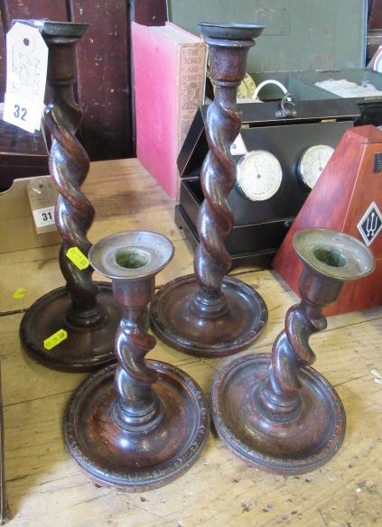 TWO PAIRS OF BARLEY TWIST CANDLESTICKS Image