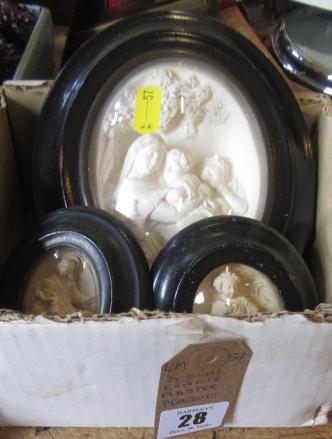 THREE OVAL FRAMED PLASTER PLAQUES Image