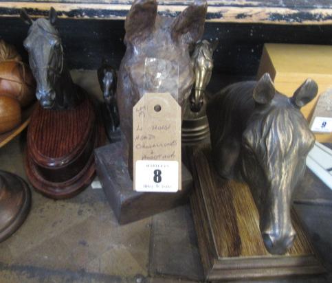 FOUR HORSE HEAD ORNAMENTS AND ANOTHER Image
