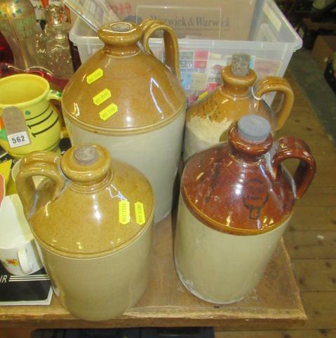 FOUR VINTAGE STONEWARE FLAGONS Image