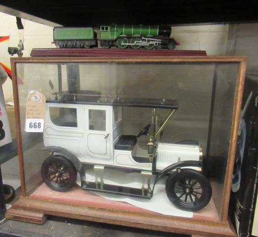 Model limousine benz car in display case and flying scotsman train ...