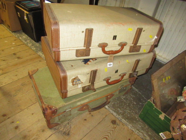 THREE VINTAGE SUITCASES Image