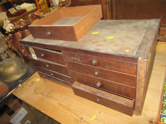 BANK OF MINIATURE DRAWERS Image