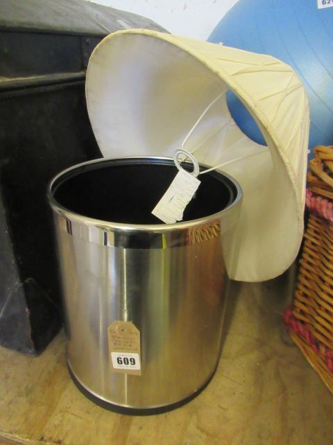 STAINLESS STEEL WASTE BIN AND A LAMPSHADE Image