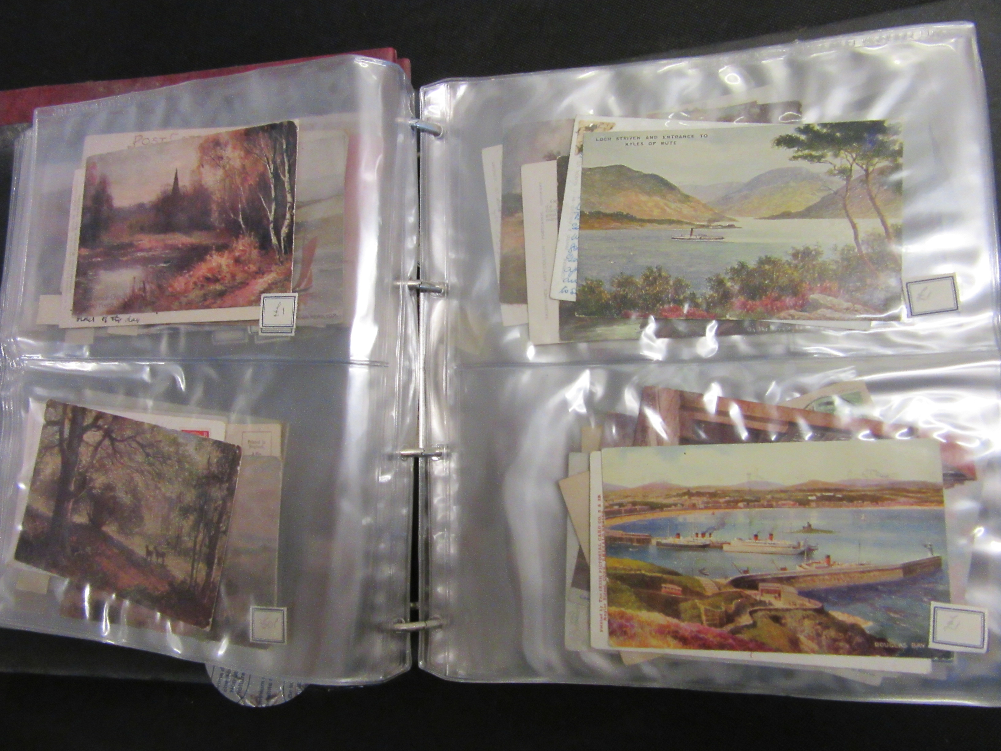 TWO ALBUMS OF OLD POSTCARDS Image