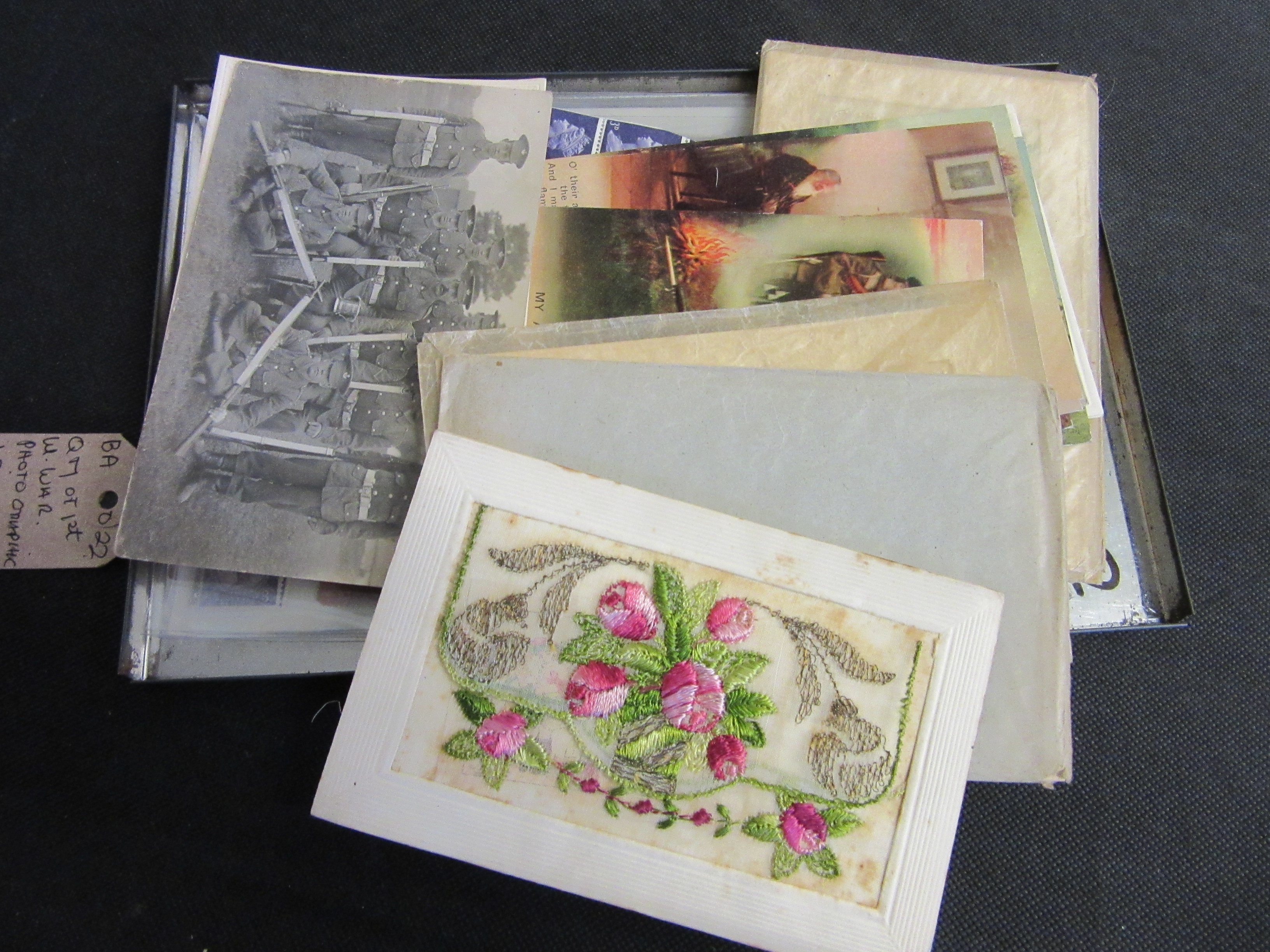 QUANTITY OF WWI PHOTOGRAPHIC AND SILK POSTCARDS WITH STAMP COLLECTION Image