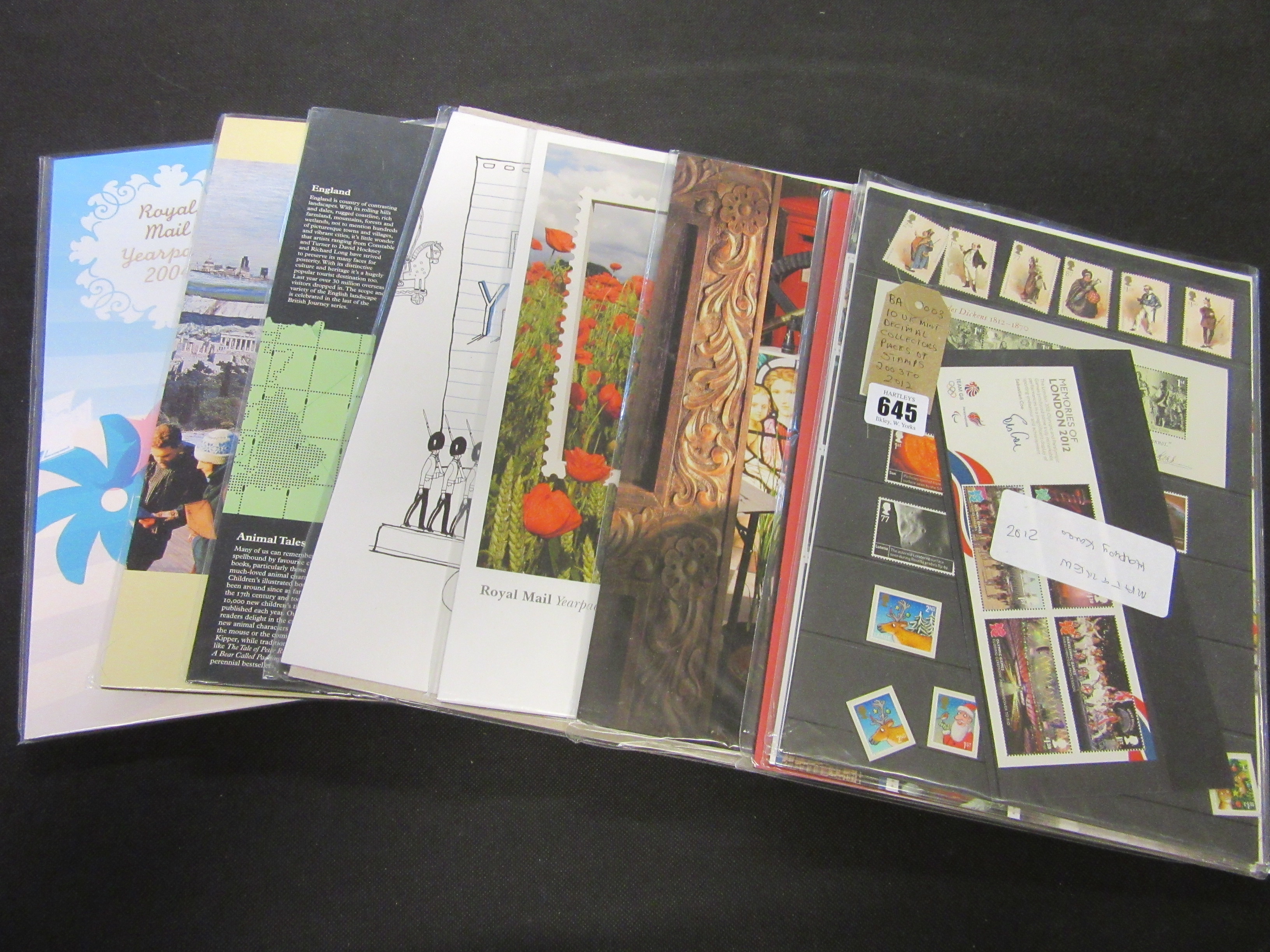 TEN UK MINT DECIMAL COLLECTORS PACKS OF STAMPS 2003-2012 Image