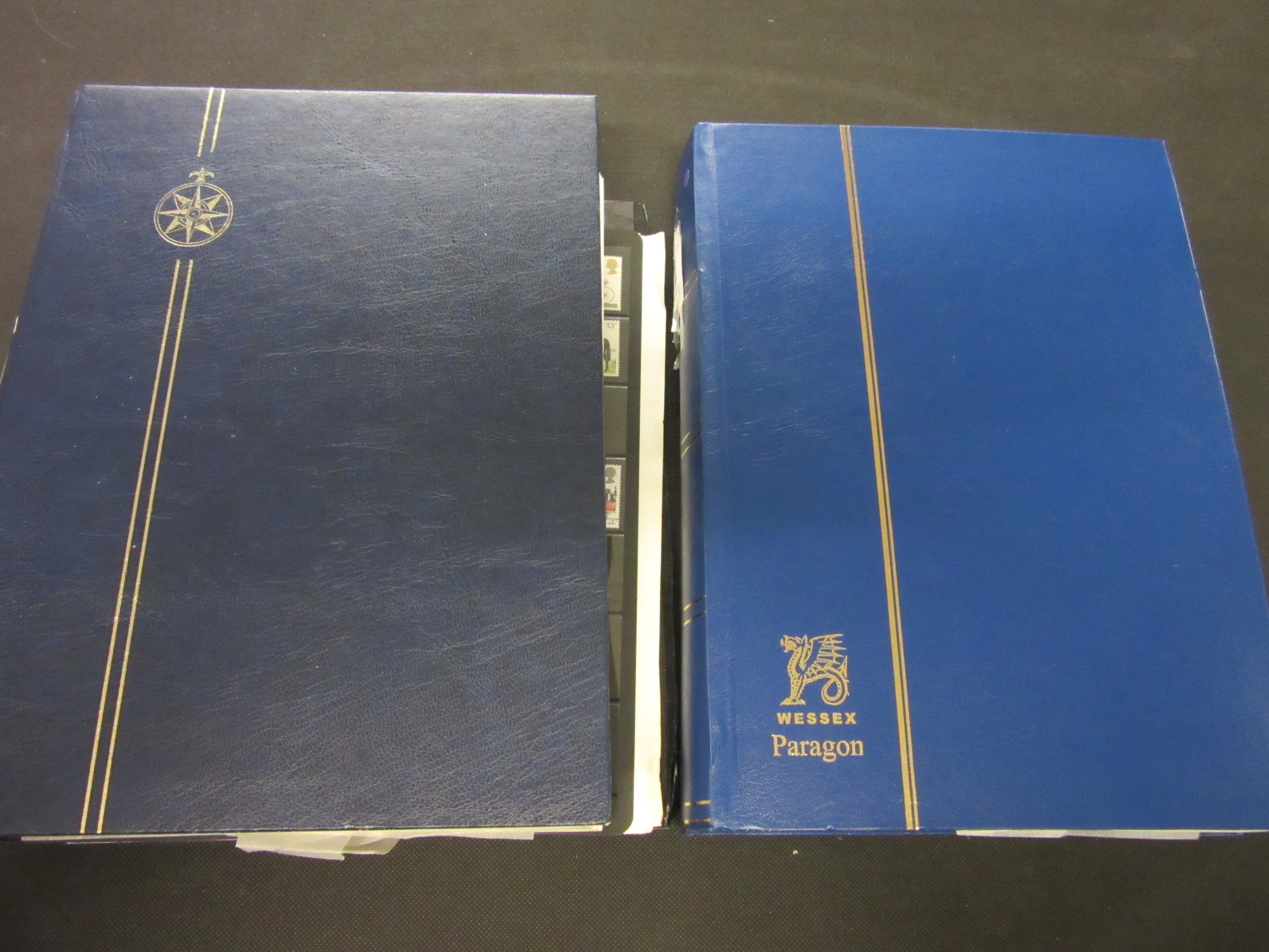 TWO ALBUMS OF MINT AND USED UK STAMPS Image