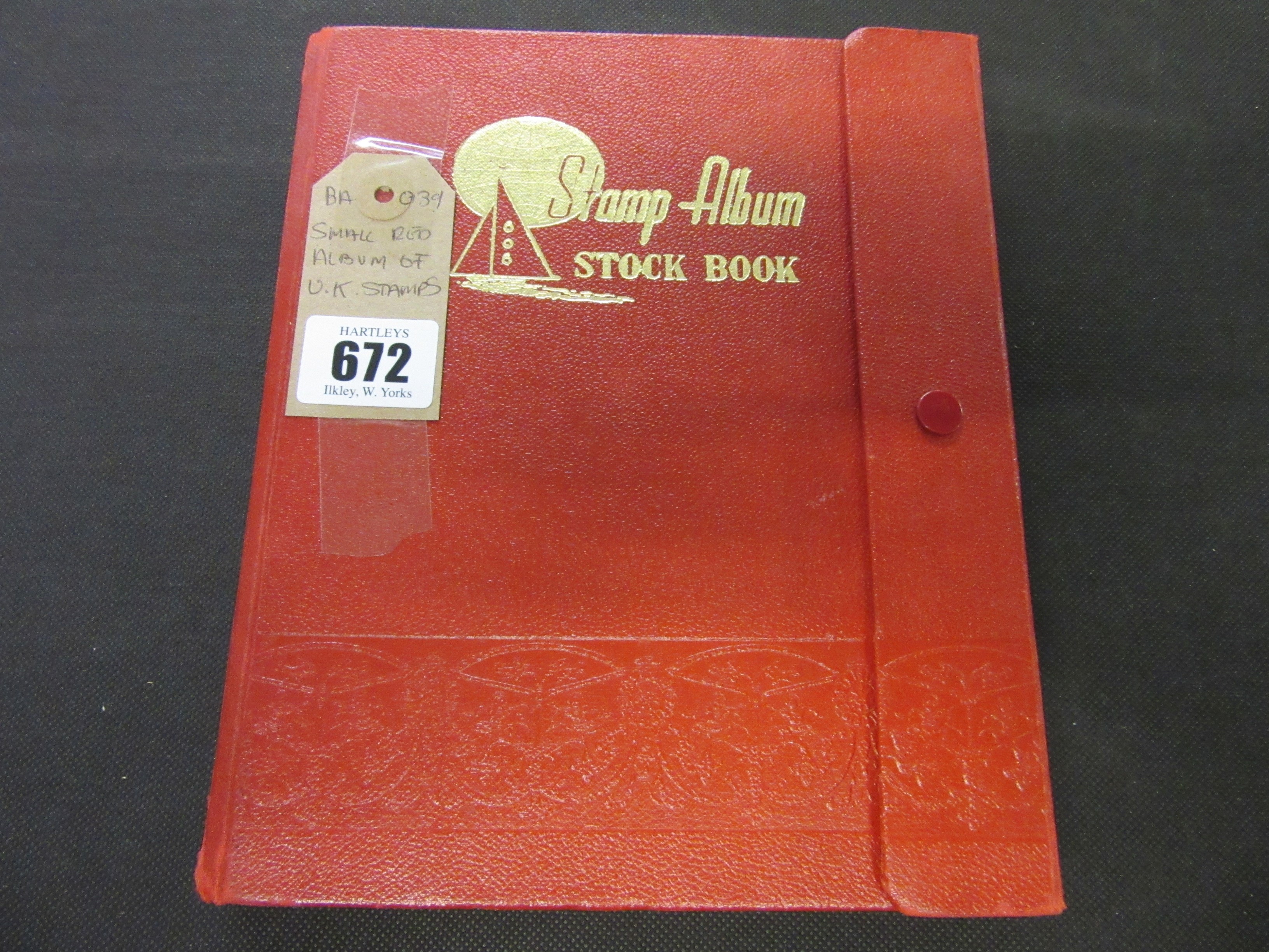 SMALL RED ALBUM OF UK STAMPS Image