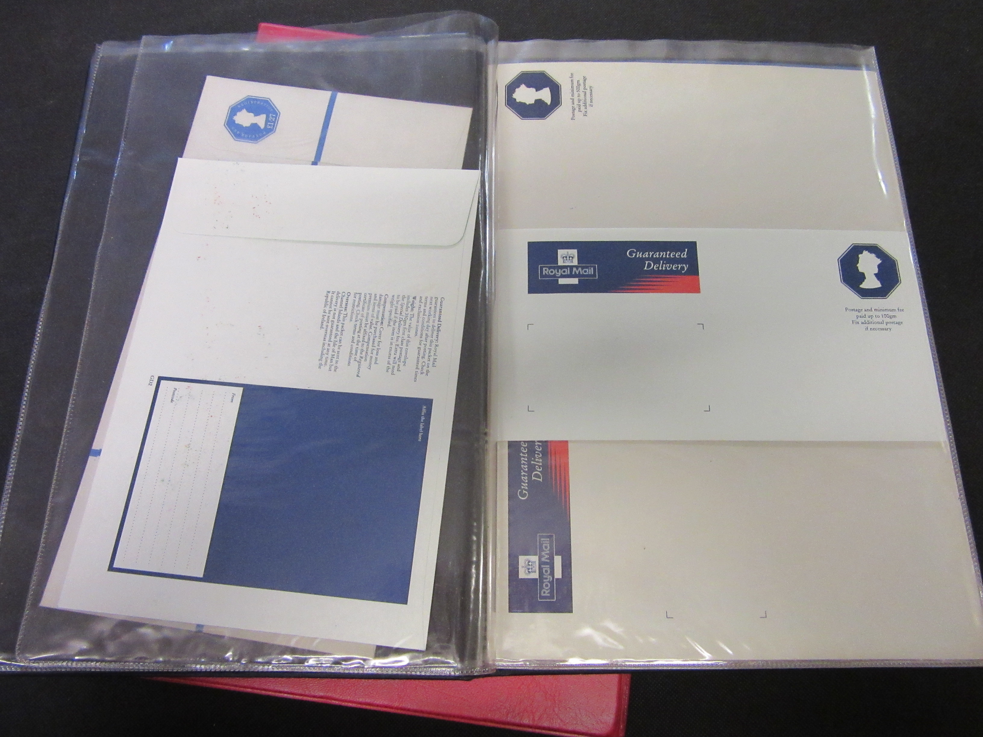TWO ALBUMS OF REGISTERED POST PRE-PAID ENVELOPES AND POSTCARDS Image