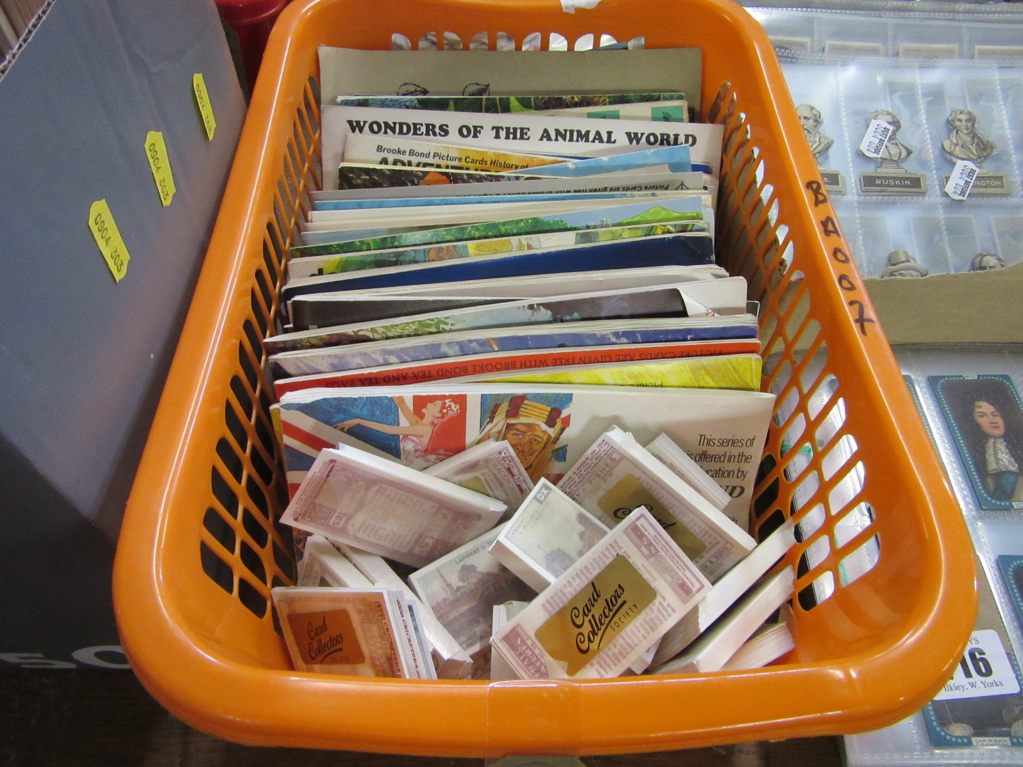 ORANGE TUB OF CIGARETTE CARDS IN ALBUMS AND SETS OF CARDS Image