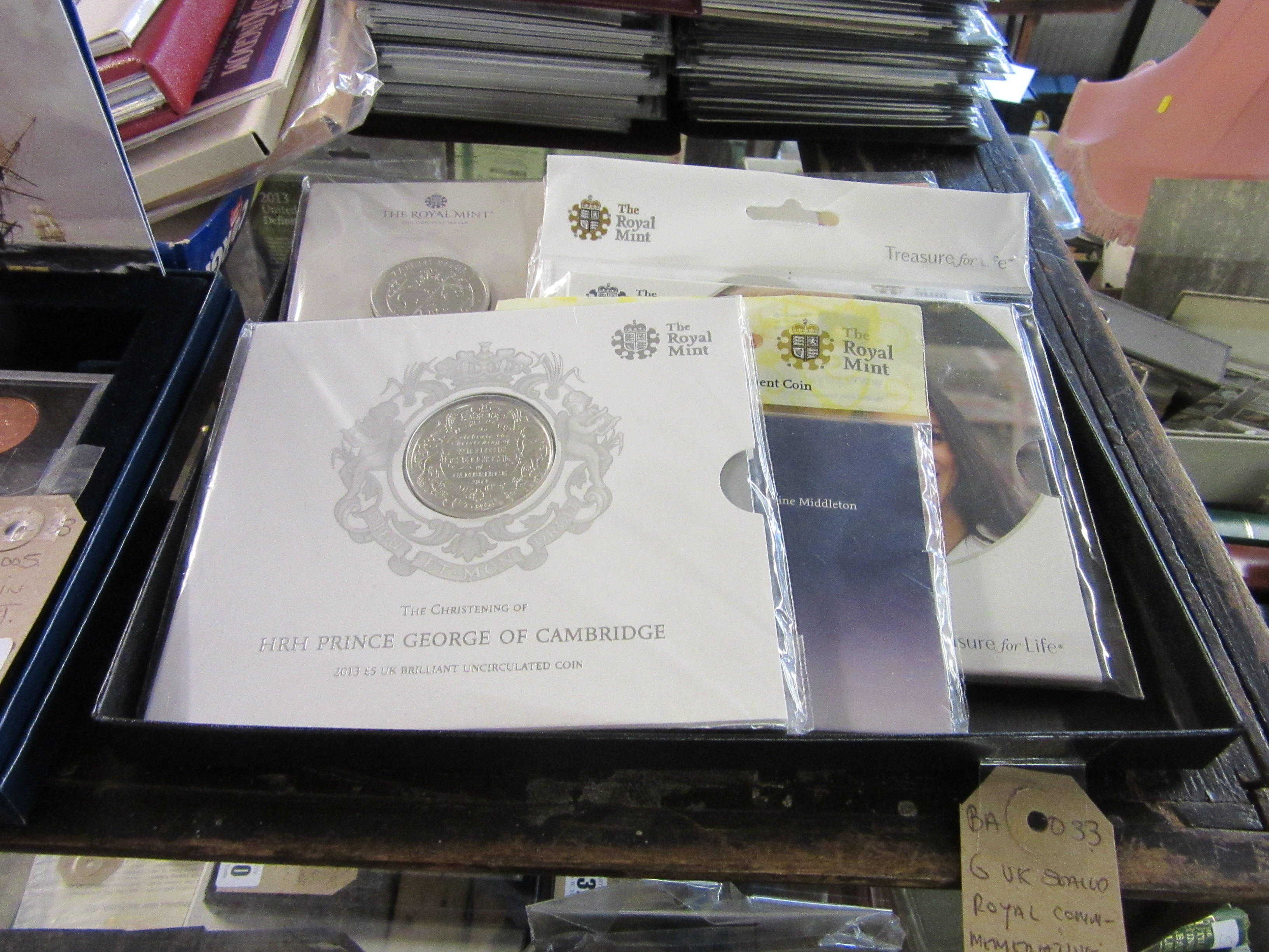 SIX UK SEALED ROYAL COMMEMORATIVE COINS WITH A GHANDI FIVE POUND COIN Image