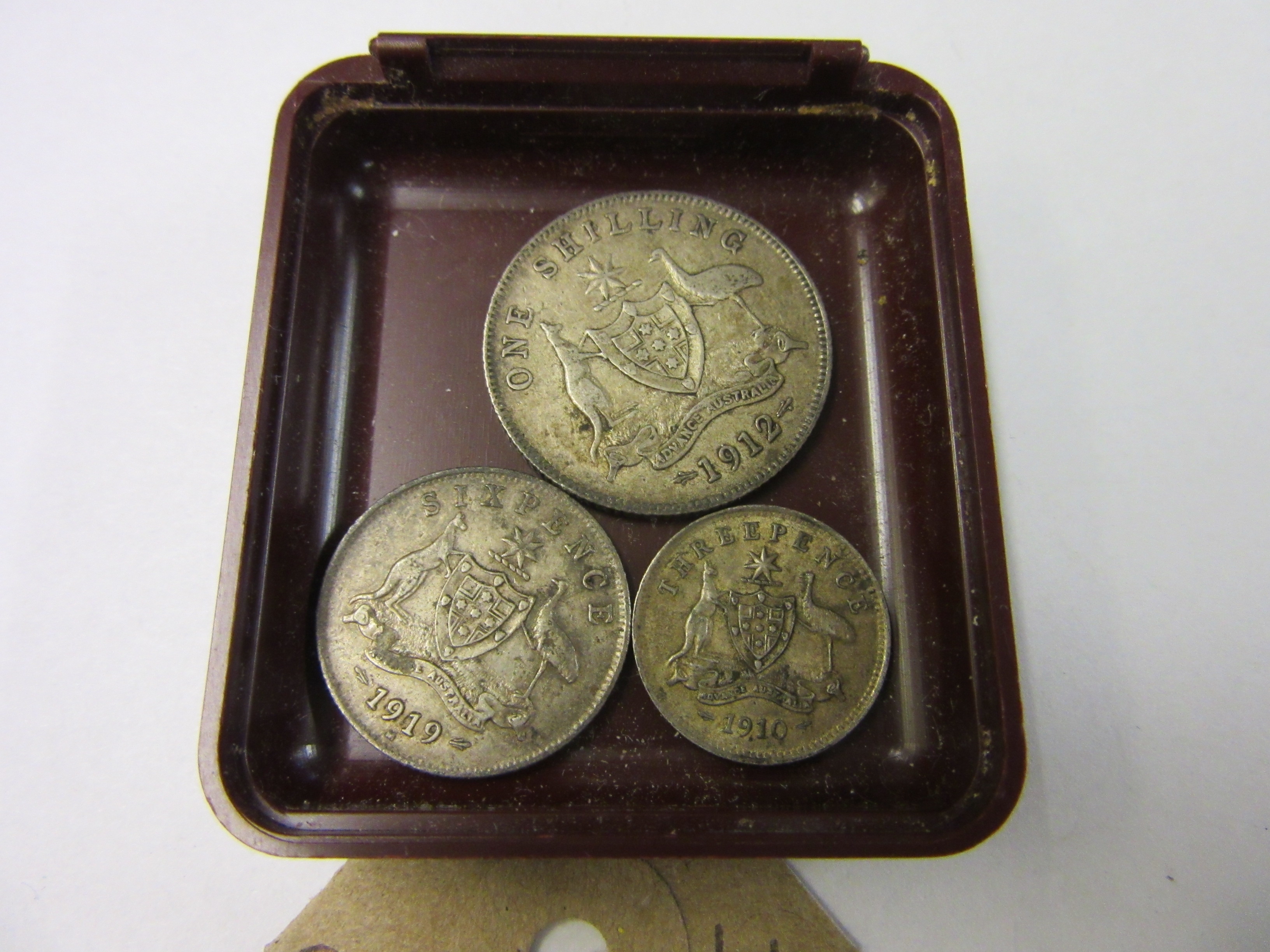 AUSTRALIAN SILVER 1912 SHILLING, 1919 SIXPENCE AND 1910 THREE PENNY COINS Image