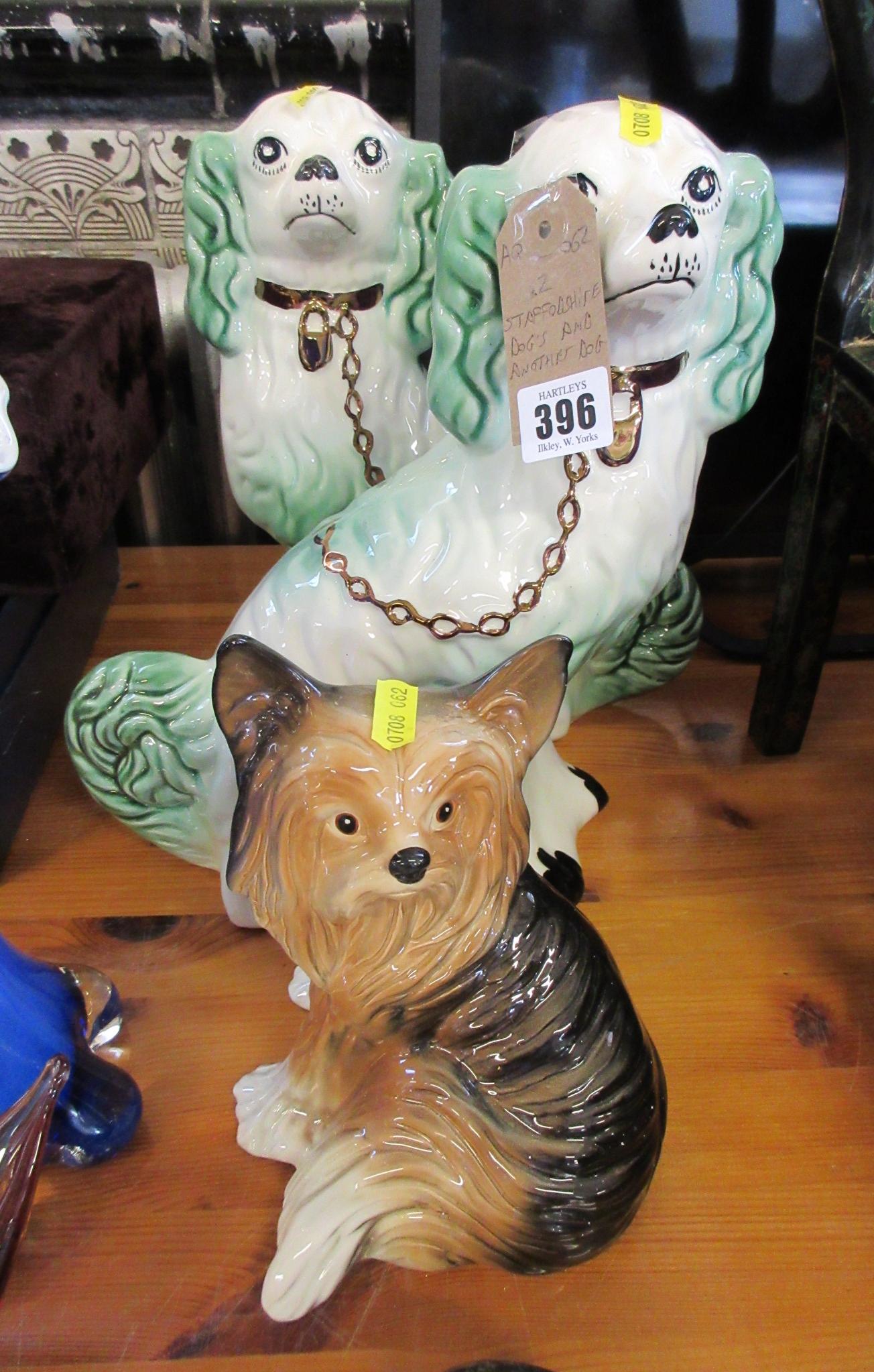 TWO STAFFORDSHIRE DOGS AND A YORKSHIRE TERRIER Image