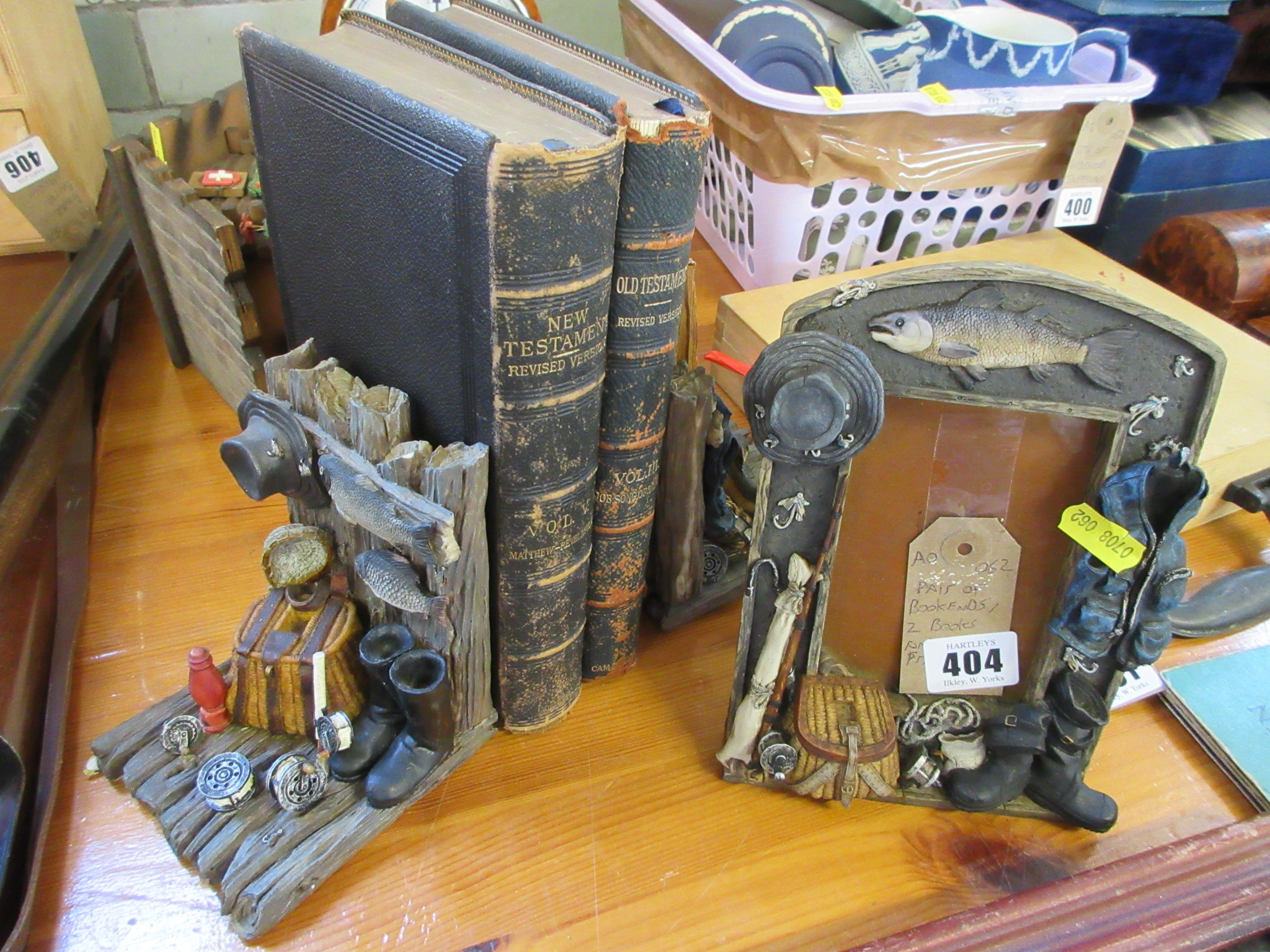 PAIR OF BOOKENDS TWO BOOKS AND A PICTURE FRAME Image