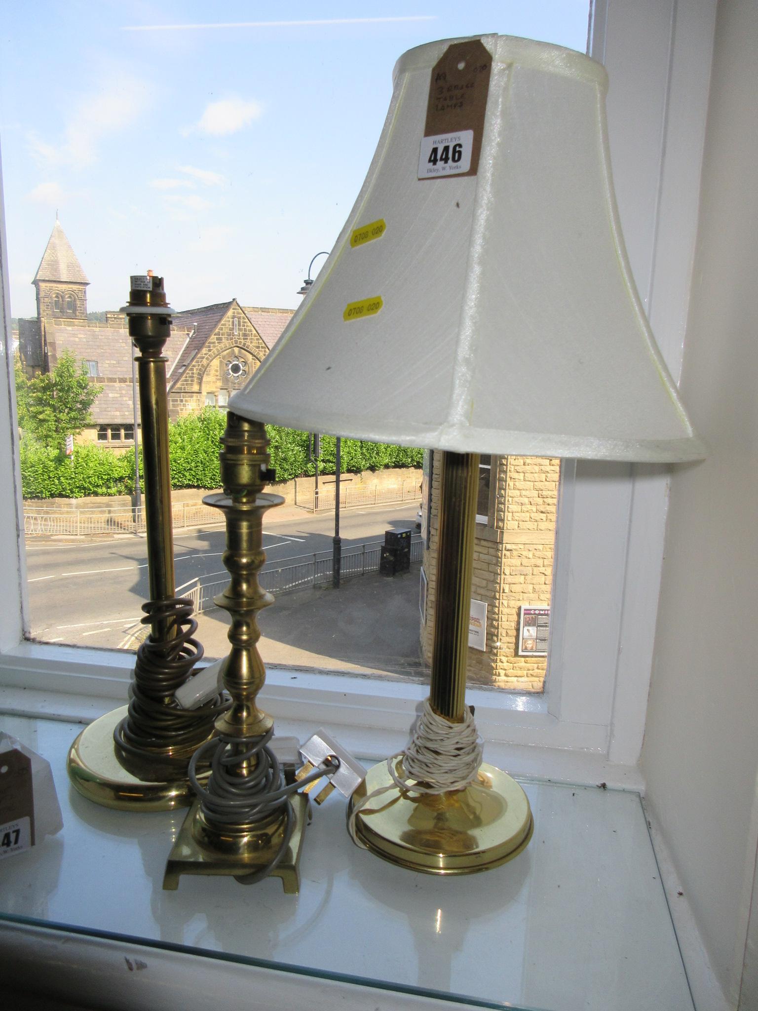 THREE BRASS TABLE LAMPS Image