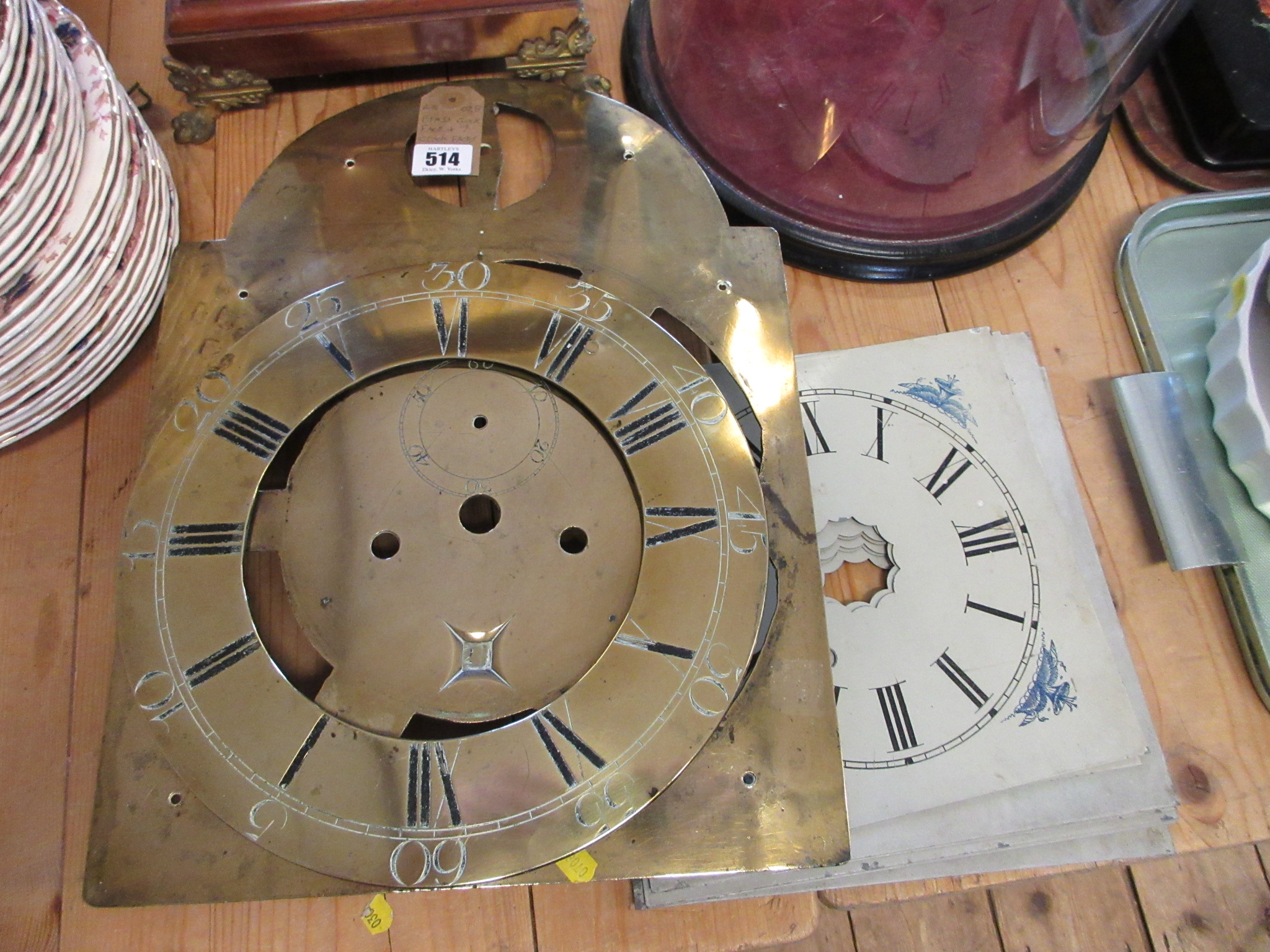 BRASS CLOCK FACE AND SIX PAINTED OTHER CLOCK FACES Image