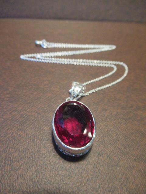 SILVER AND RED STONE PENDANT ON SILVER CHAIN Image