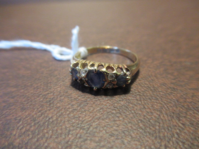 18CT GOLD SAPPHIRE AND DIAMOND RING Image