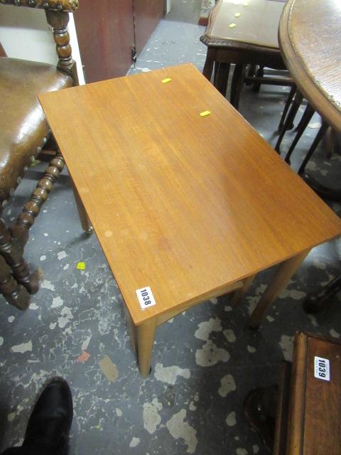 NEST OF RETRO TABLES ON CASTORS Image
