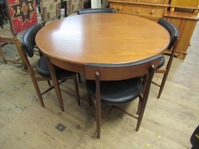 G PLAN DINING TABLE AND FOUR CHAIRS AND A SIDEBOARD Image
