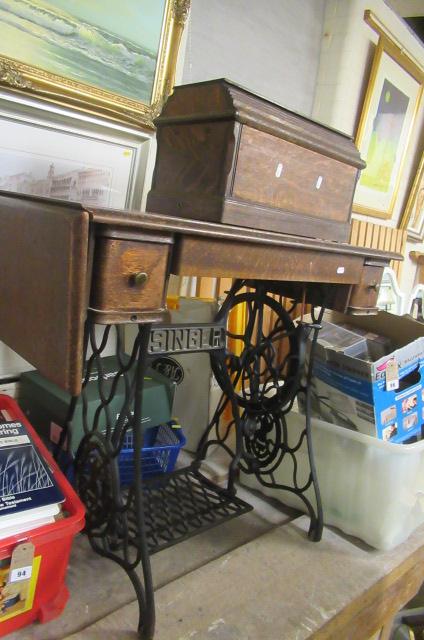 SINGER SEWING MACHINE INCLUDING TREADLE BASE Image