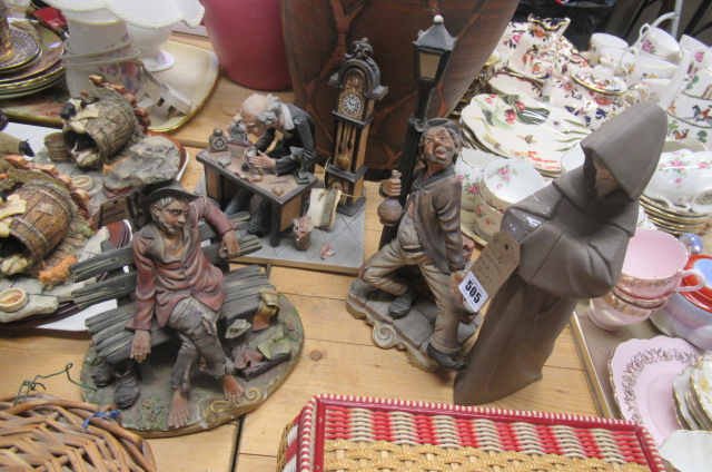 LLADRO MONK FIGURE WITH THREE CONTINENTAL SCULPTURES Image