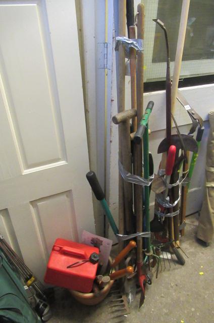 TWO BUNDLES OF GARDEN TOOLS Image