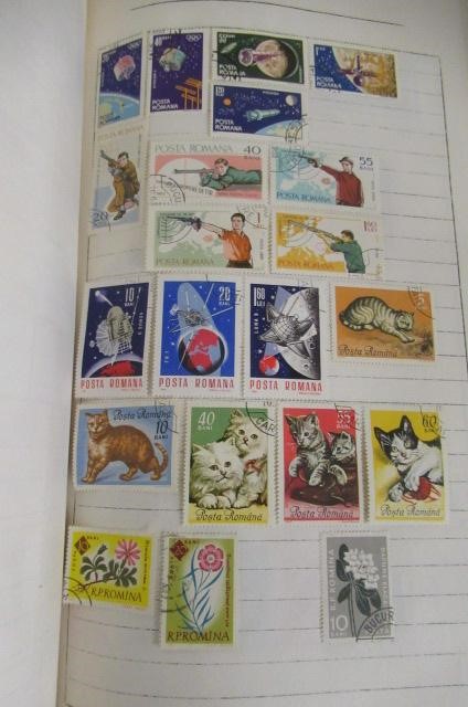 TWO ALBUMS OF WORLD AND USA STAMPS Image