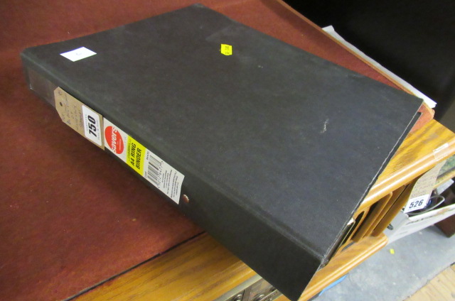 BLACK ALBUM OF STAMPS Image