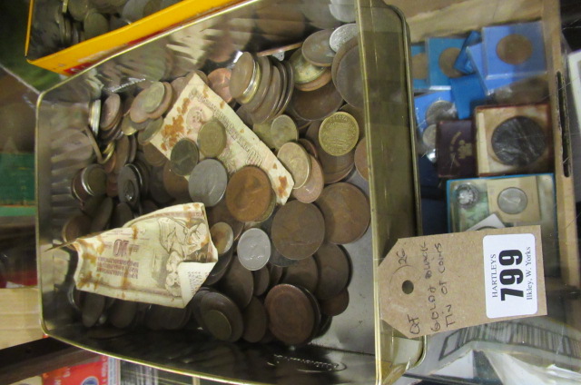GOLD AND BLACK TIN OF COINS Image