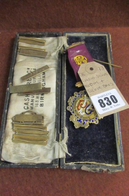 CASED SILVER MEDAL AND SILVER BARS Image