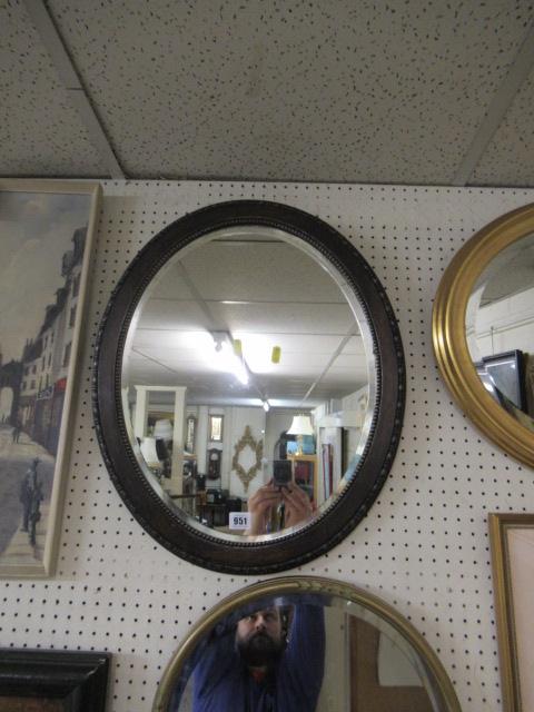 ONE OAK FRAMED MIRROR AND A GILT FRAMED MIRROR Image