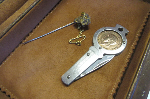 GOLD AND MINERAL STICK PIN AND A PEN KNIFE Image