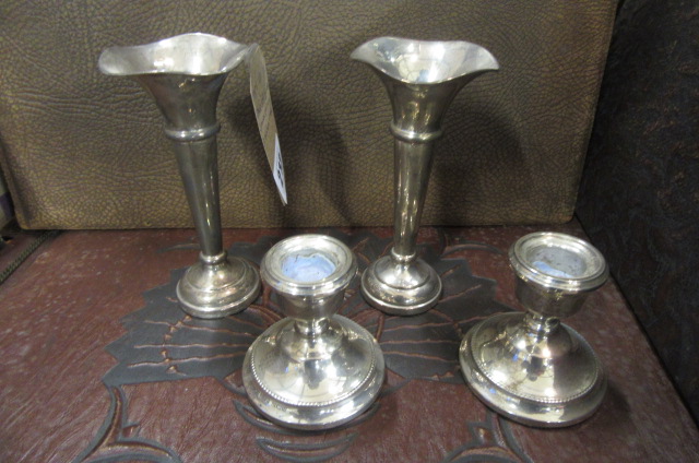 PAIR OF SILVER CANDLESTICKS AND A PAIR OF VASES Image