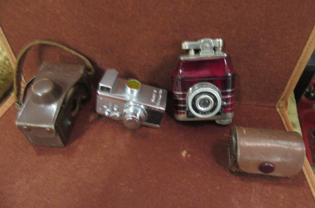 PETIE CAMERA / CIGARETTE LIGHTER AND MINIATURE STEKY CAMERA Image