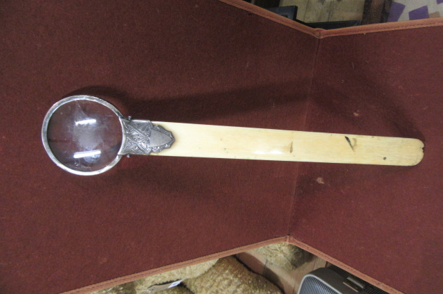SILVER AND IVORY PAGE TURNER WITH MAGNIFYING GLASS Image
