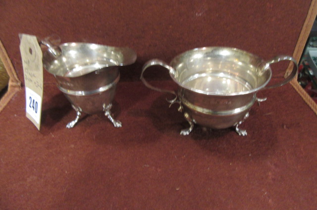 SILVER DISH AND JUG Image