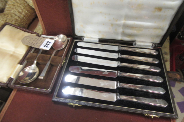 CASE OF SIX SILVER HANDLED BUTTER KNIVES AND TWO SILVER SPOONS Image
