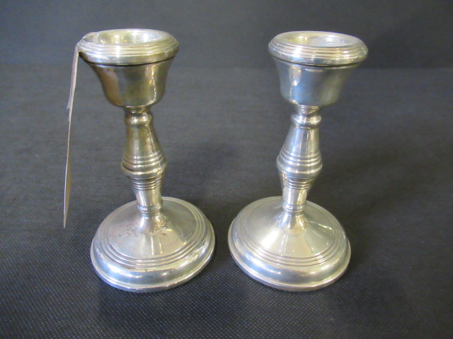 PAIR OF SILVER CANDLESTICKS Image