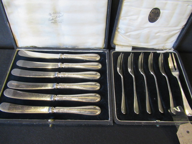 TWO CASES OF SILVER KNIVES AND FORKS Image
