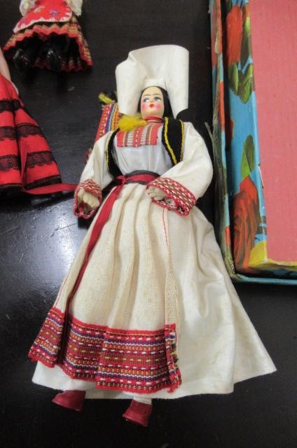BOX OF FOUR SMALL DOLLS Image