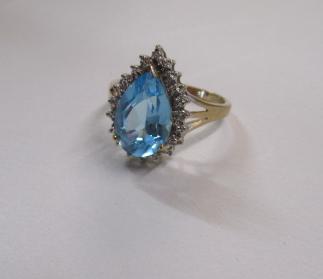 PEAR CUT TOPAZ AND DIAMOND 9CT GOLD RING Image