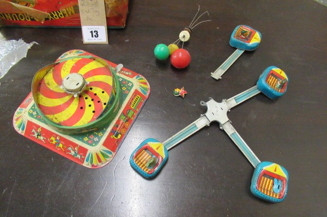 TIN PLATE MUSICAL MERRY GO ROUND TOY Image