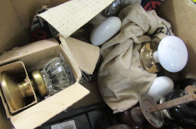 TWO BOXES OF VINTAGE GLASS AND OTHER DOOR HANDLES Image