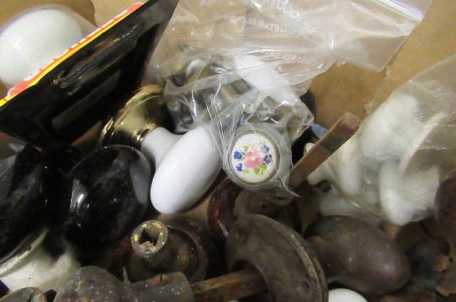 TWO BOXES OF VINTAGE GLASS AND OTHER DOOR HANDLES Image