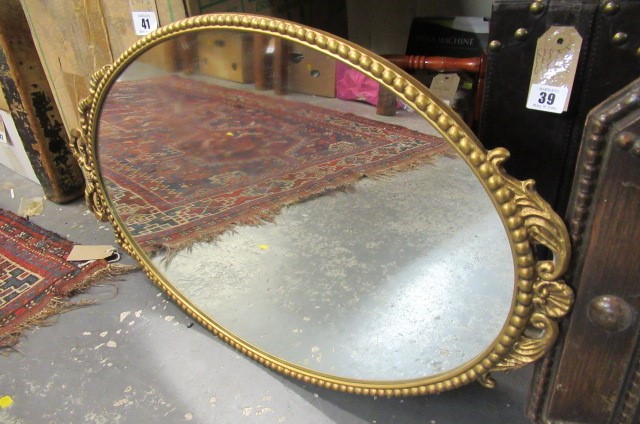 OAK FRAMED MIRROR AND A GILT FRAMED MIRROR Image