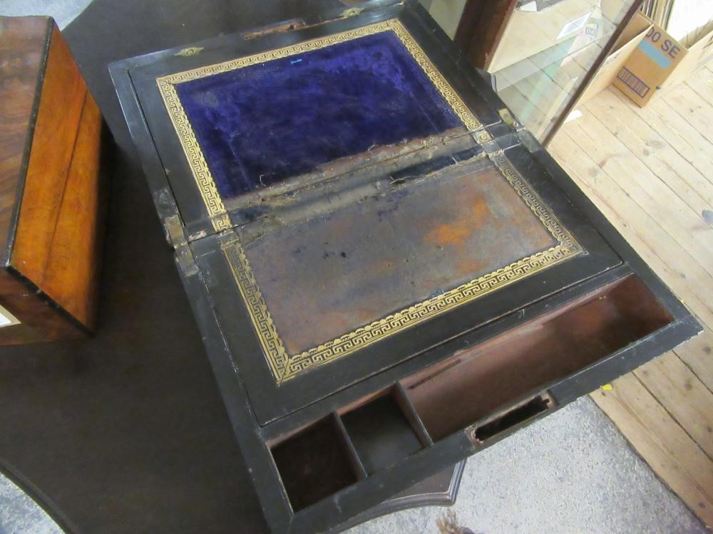 WALNUT BRASS BANDED WRITING SLOPE AND AN EBONY WRITING SLOPE Image