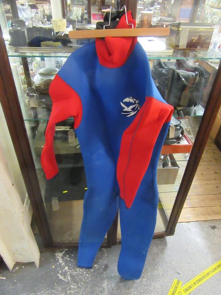 ONE ADULT AND TWO CHILDREN'S WET SUITS Image