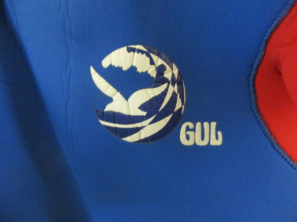 ONE ADULT AND TWO CHILDREN'S WET SUITS Image